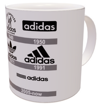 Carica l'immagine nel visualizzatore di Gallery, Tazza Adidas logo history 1924-2005
